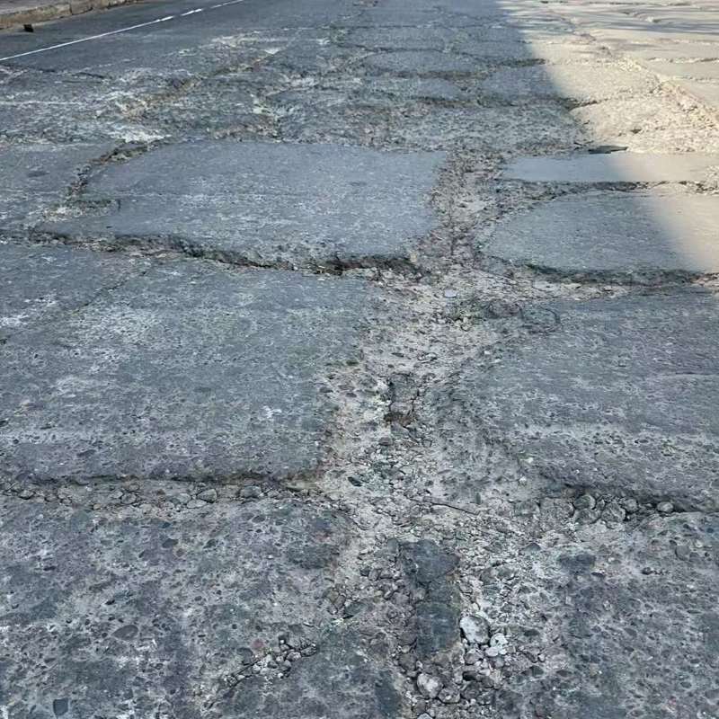 嫩江路面起砂露石子修补料